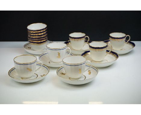 Six 19th century Derby tea bowls, with blue and gilt decoration, purple marks to base, four Derby saucers and three Derby tea