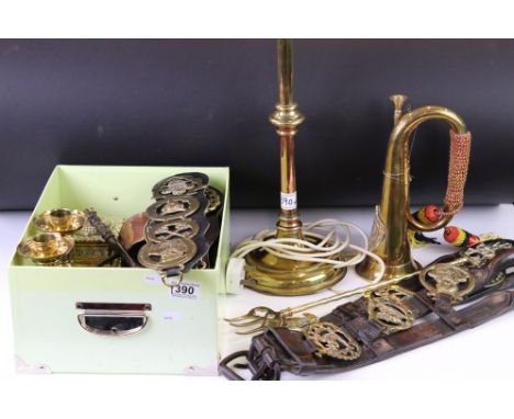 A small collection of mixed brassware to include horse brasses, candlesticks, bugle....etc. 