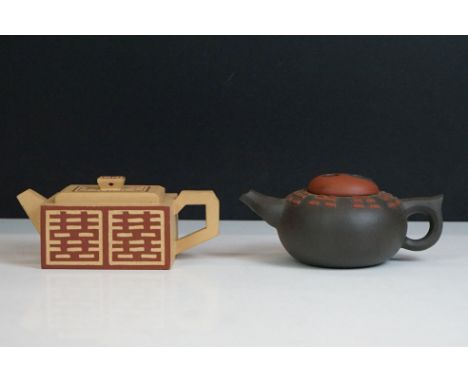 Two Chinese Yixing ceramic teapots &amp; covers to include a geometric rectangular example (6.5cm high) and a further example