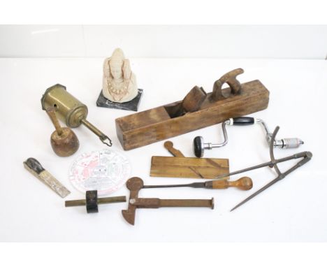 A small collection of tools to include wood planes together with a female ornamental bust and a door stop. 