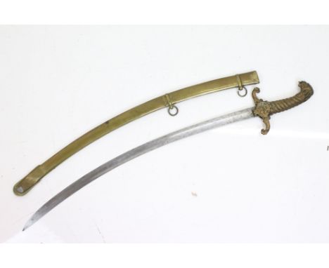 A vintage sabre sword with brass scabbard and cast metal handle and guard. 