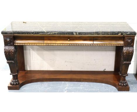 Henredon: a substantial modern American Empire style console table having heavily carved supports, single drawer and marble t