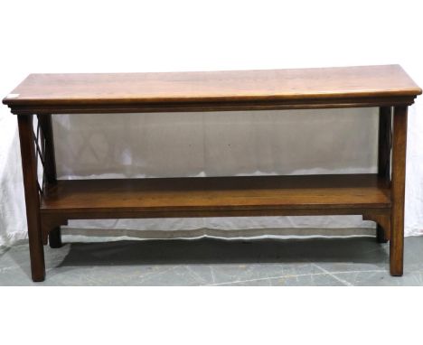 A contemporary end or console table, having latticed end panels and under shelf, 105 x 46 x 75 cm H. Not available for in-hou