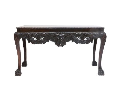 A Late 19th Century Irish Mahogany Console Table, in George III style, the moulded top with carved border above a scrolled ap