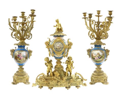 A French Ormolu and Porcelain Mounted Striking Mantel Clock Garniture, circa 1890, the imposing case surmounted by a classica