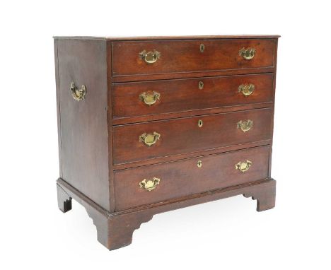 A George III Oak Straight-Front Chest of Drawers, 3rd quarter 18th century, the moulded top above four long oak-lined drawers