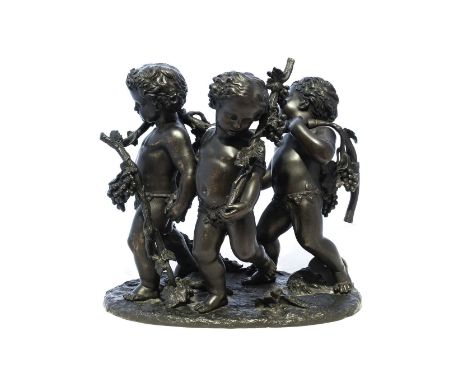 French School (19th century): A Bronze Group of Three Bacchic Putti, carrying fruiting vine on an oval vase34cm highBase slig