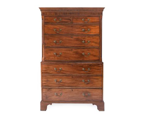 A George IIII Mahogany Chest on Chest, late 18th century, the dentil cornice above two short and three long oak-lined drawers