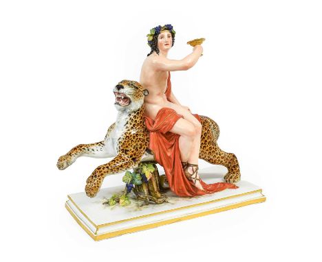 A Meissen Porcelain Figure Group, modelled by Friedrich Rentsch (1836-1899), as Bacchus with fruiting vines in his hair holdi