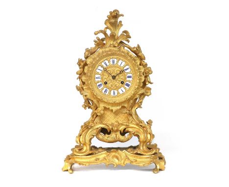 A French Bronze Ormolu Striking Mantel Clock, circa 1850, elaborately scroll and leaf decorated case, cast dial with blue Rom