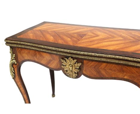 A Louis XV-Style Rosewood, Tulipwood and Gilt-Metal-Mounted Foldover Card Table, circa 1880, the quarter-veneered and crossba