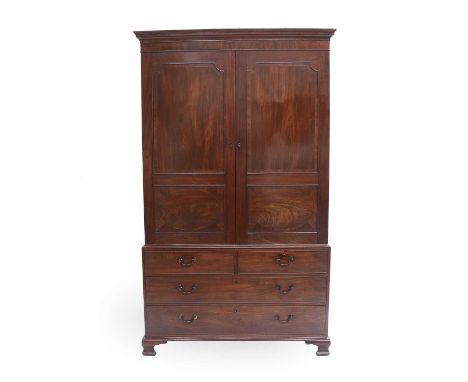 A Late George III Mahogany, Crossbanded and Boxwood-Strung Linen Press, early 19th century, the moulded cornice above a plain