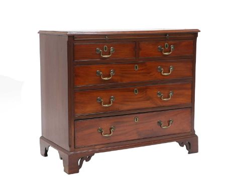 A George III Mahogany Straight-Front Chest of Drawers, late 18th century, the moulded top above a pull-out green baize brushi