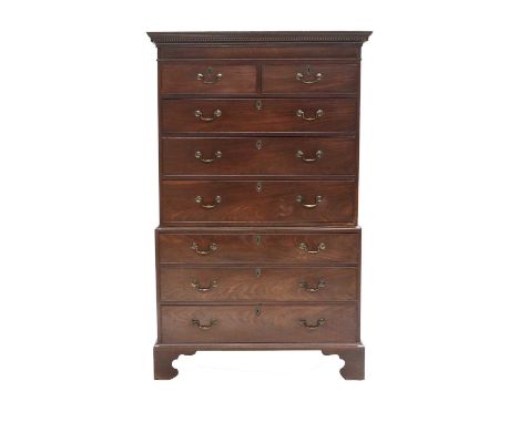A George III Mahogany Chest on Chest, late 18th century, the moulded cornice above a dentil frieze and two short over six lon