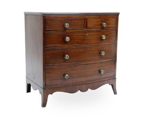 A George IV Mahogany Bowfront Chest of Drawers, 2nd quarter 19th century, the moulded top above two short and three oak-lined