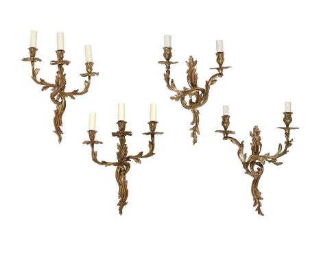 A Pair of Louis XV-Style Gilt Metal Two-Light Wall Appliques, of rococo cast form with acanthus leaves, the scrolled arms sup