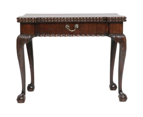 A George III Chippendale-Style Carved Mahogany Foldover Card Table, circa 1770, the hinged leaf enclosing a green baize-lined