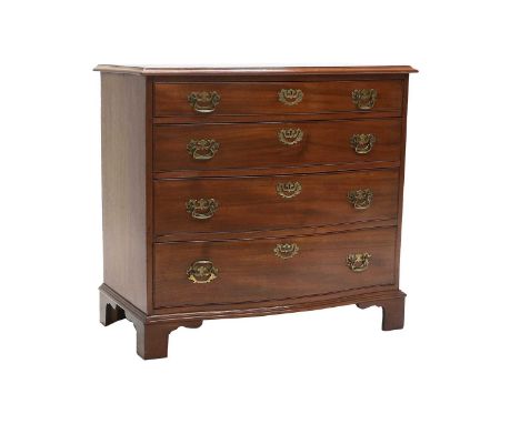 A George III Mahogany Serpentine Chest of Drawers, early 19th century, the moulded top above four long graduated drawers with