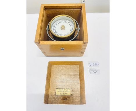 A boxed ships gimbal compass