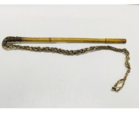A unusual bamboo handled whip