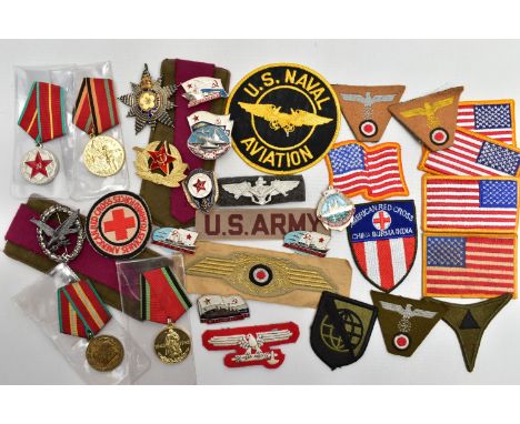 A BOX OF MILITARY RELATED PATCHES AND BADGES, including a metal breast Star/pin brooch style badge for the Honourable order o