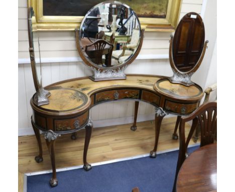 A 1930's chinoiserie dressing table with side revolving mirrors W.160cm