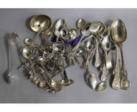 A quantity of assorted silver and plated flatware including silver sauce ladle and silver table spoons.