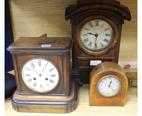 Three mantel clocks
