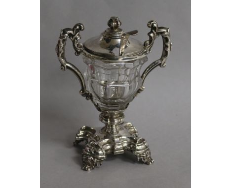 A French silver mounted cut glass mustard pot, with English silver mustard ladle.