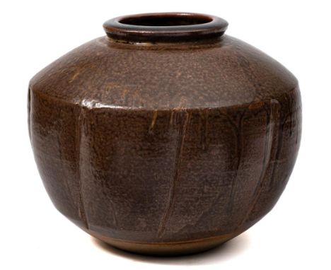 *David Leach (1911-2005) a stoneware jar: of shouldered and lobed form under brown glazes, impressed personal and Lowerdown s