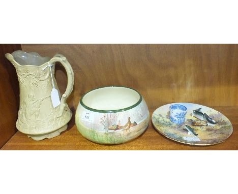A mid-19th century English moulded pottery jug decorated with hunting scenes by E Walley of Cobridge, registration mark to ba