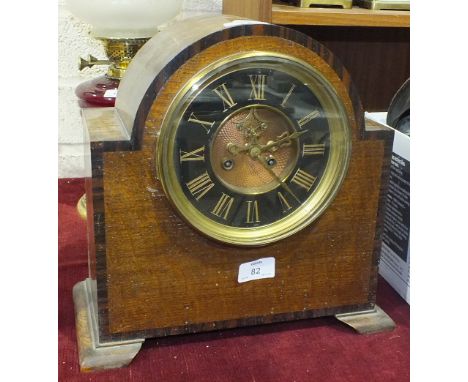 An oak-cased dome-top chiming mantel clock with visible escapement, 31cm high, 32cm wide, (case a/f).