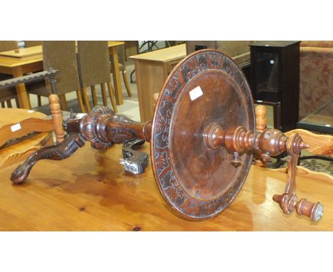 A Victorian carved walnut shaving stand on damaged tripod supports and a hardwood wall shelf, 122cm long, 34cm high, (2).