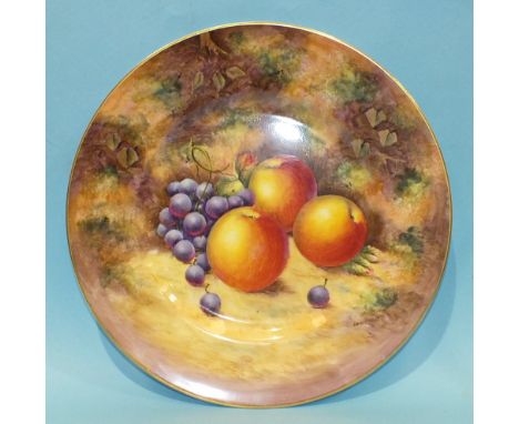 A Royal Worcester cabinet plate painted with grapes and apples on a mossy bank, signed 'Sibley Lewis', with gilt edge and bla