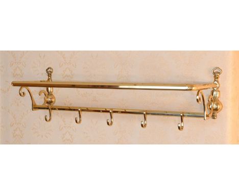 A 20th Century Brass Wall Shelf, with baluster and scrolled brackets and coat hooks  78cm wide Two Solid Brass Cauldron Shape