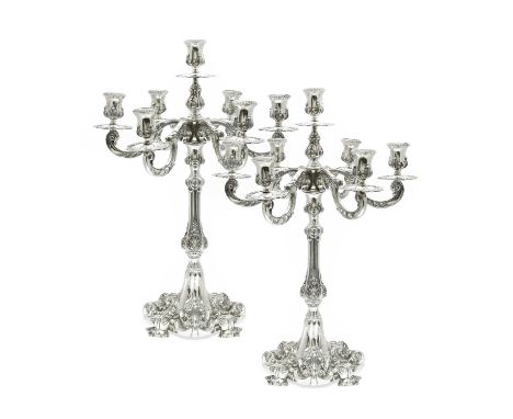 A Pair of Portuguese Silver Seven-Light Candleabra, by Topázio, Porto, 1938-1984, each in the rococo-style, the based cast an