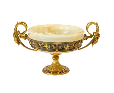 A French Gilt Metal, Champlevé Enamel and Onyx Tazza, late 19th century, of circular form with entwined strap and mask handle