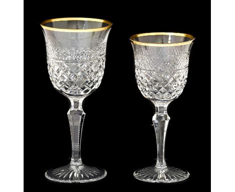 A Set of Twelve Wine Glasses, the bell shaped bowls with gilt line rims over bands of geometric cutting 18.5cm high Twelve Wh