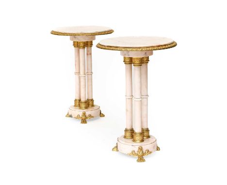A Pair of 20th Century Marble and Gilt Metal-Mounted Circular Lamp Tables, the pink and grey veined marble tops within a stif