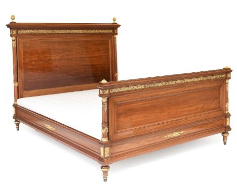 A Louis XVI-Style Mahogany and Gilt Metal-Mounted 5ft Bedstead, late 19th century, the panelled headboard and footboard with 