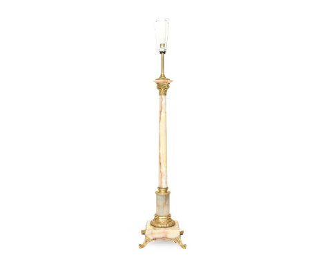 An Alabaster and Gilt Metal Mounted Standard Lamp, 181cm high with shadeThis lot has been imported from outside the United Ki