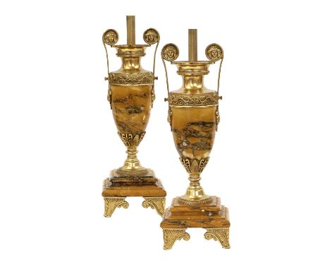 A Pair of Gilt Metal Mounted Siena Marble Urns, in Empire style, of twin scroll-handled urn form cast with classical ornament