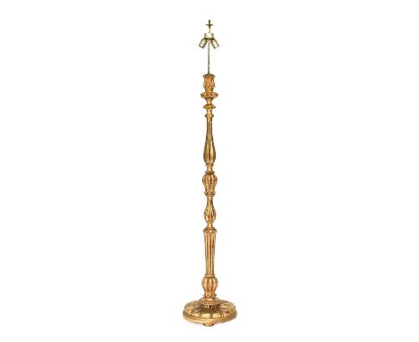 A Carved Giltwood Standard Lamp, modern, the acanthus-carved baluster support on a circular platform base 124cm high, with si