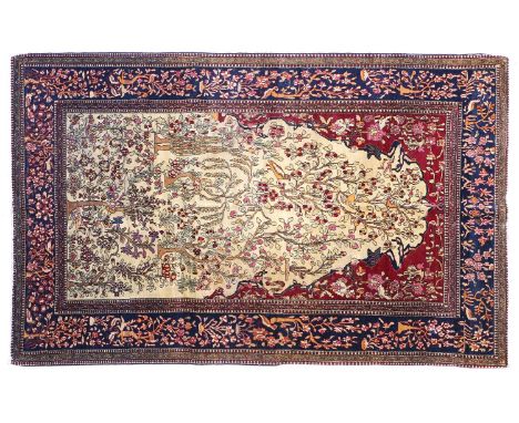 Isfahan Prayer Rug Central Iran, circa 1920 The ivory field with trees, plants and birds beneath a Mihrab framed by claret up