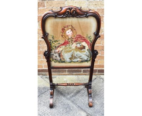 AN EDWARDIAN CARVED ROSEWOOD FRAMED FIRESCREEN  with tapestry inset panel, 54cm wide 105cm high Condition Report : good condi
