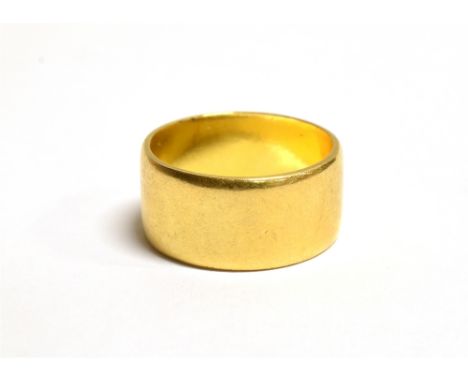 A 22CT GOLD WIDE BAND RING the ring with faded Birmingham hallmark, ring size M, band width 0.9cm, weight 7.5grams