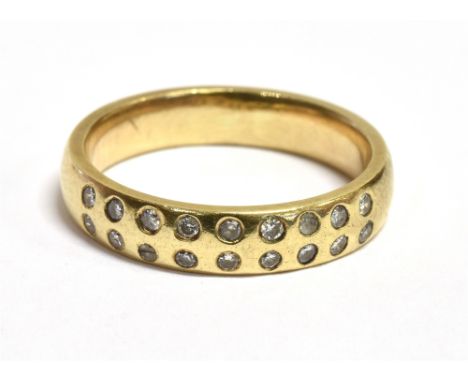 A DIAMOND ACCENTED HALF ETERNITY RING  the ring with faded hallmark to the yellow gold shank, band width 0.4cm, ring size K ½