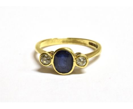 AN 18CT GOLD BLUE SAPPHIRE AND DIAMOND DRESS RING  the shank with very rubbed 750 marking, ring size M ½, weight 3.2grams