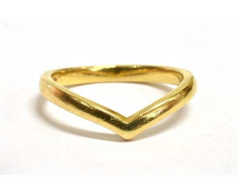A MARKED 750 YELLOW METAL WISHBONE RING  the shank marked 750 PM, ring size R ½, weight 5grams