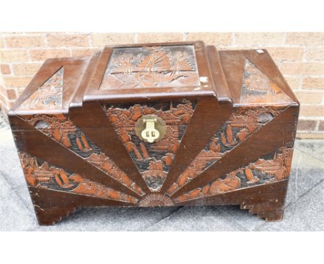 A CARVED CAMPHORWOOD TRUNK  101cm wide 53cm deep 59cm high